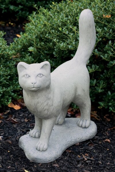 unique statue of a cuddy standing cat sculpture with tail up high